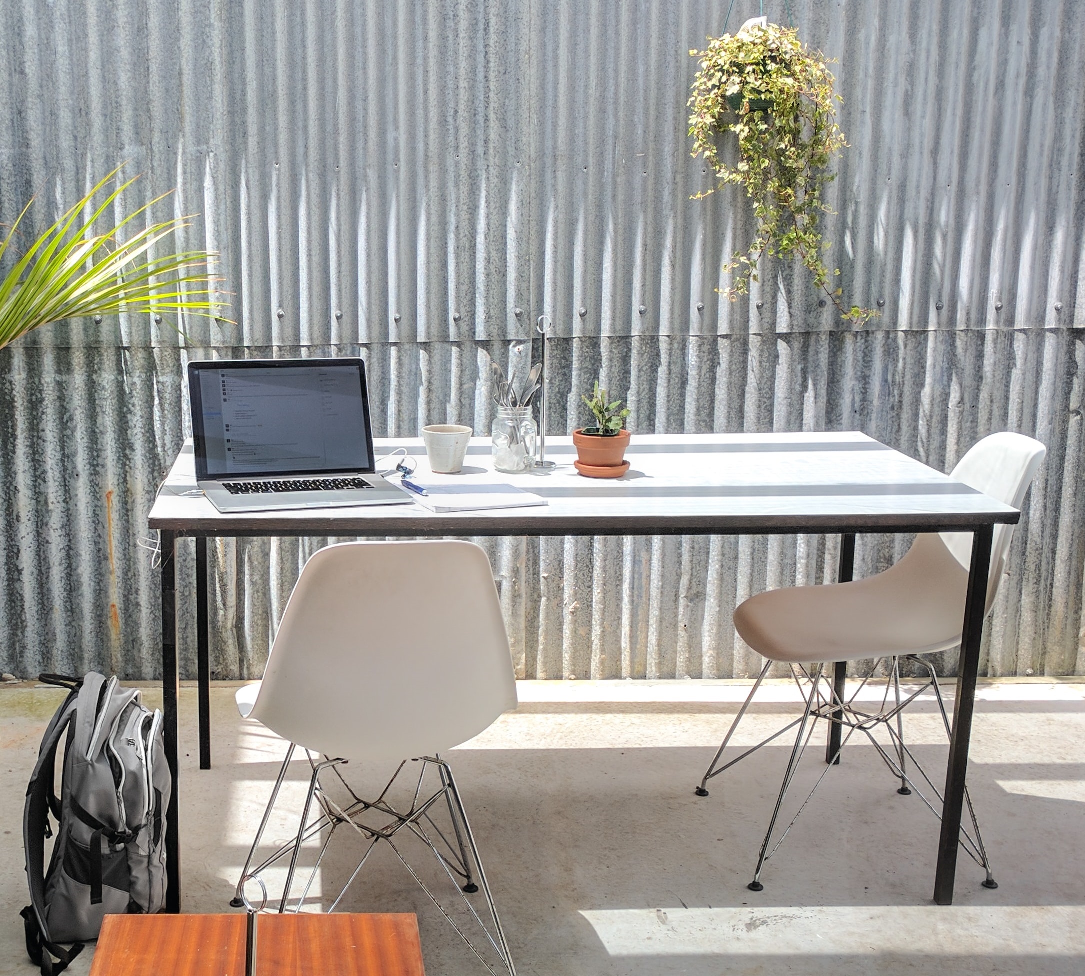 Laptop and desk in summer